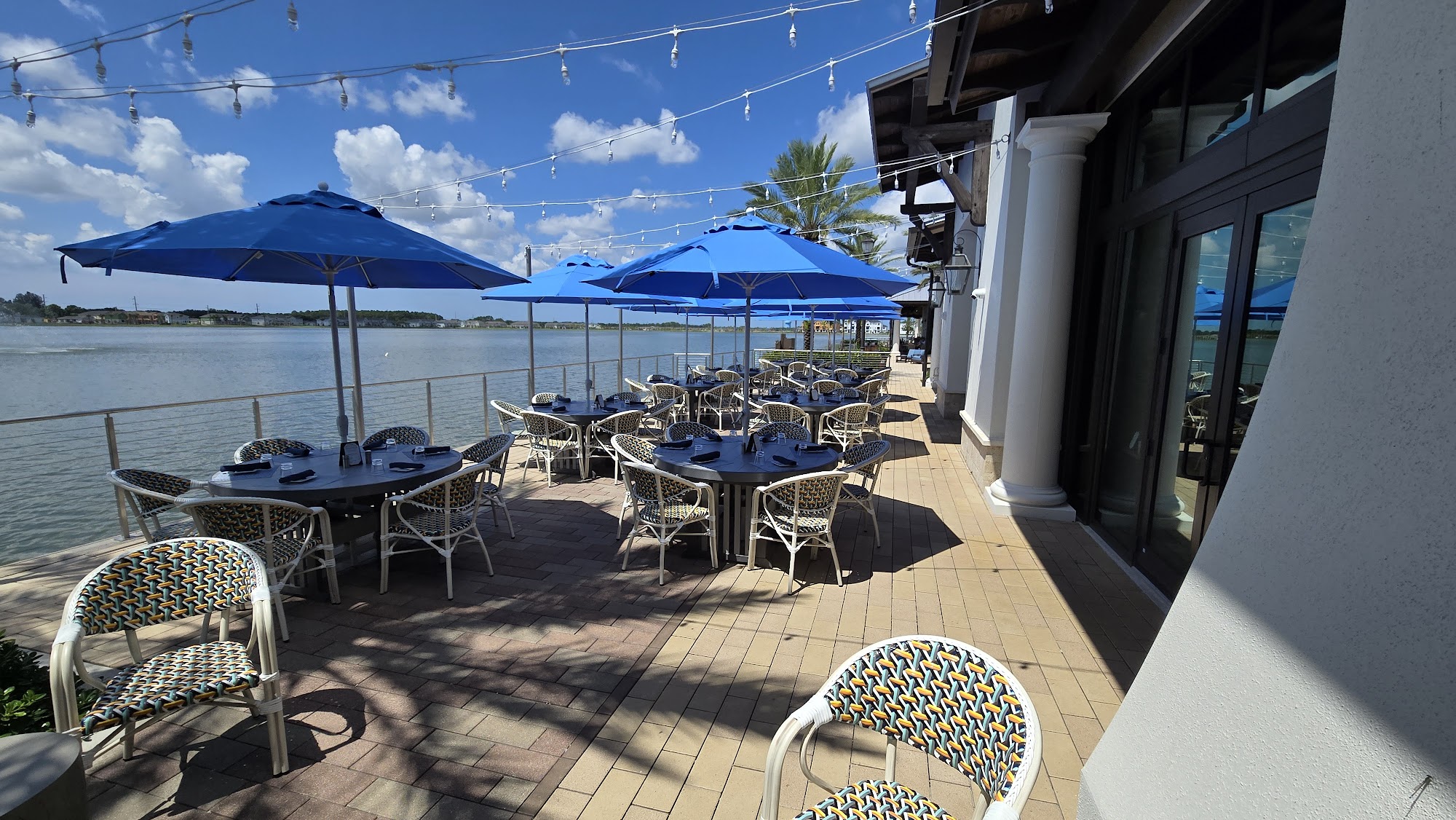 Deep Lagoon Seafood & Oyster House lakeside patio in Lakewood Ranch.